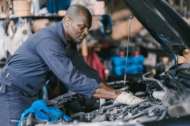 Cartechniks technician working on a vehicle